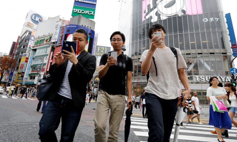 Japan city aims to ban phone use while walking Japan city aims to ban phone use while walking