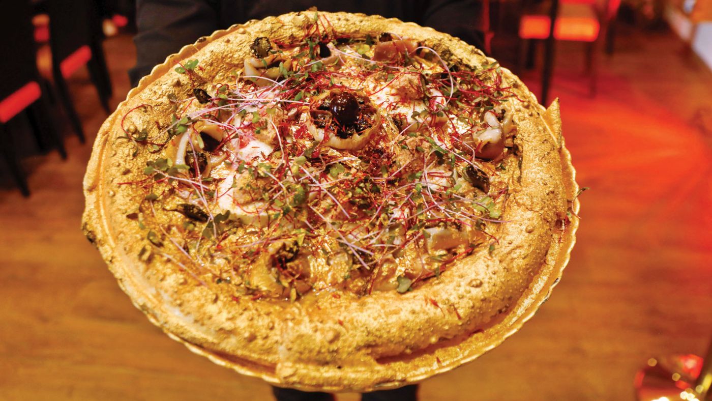 Tunisian restaurant makes africa's most expensive gold flakes pizza