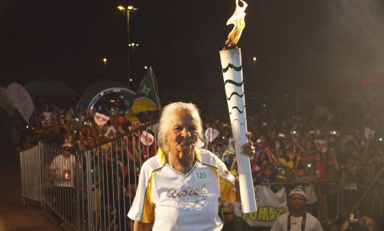 Olympics-World's oldest person pulls out of torch relay Olympics-World's oldest person pulls out of torch relay