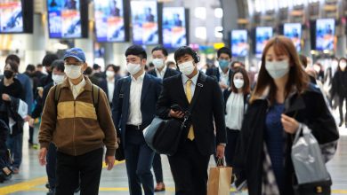 Japan bans entry of foreign visitors as omicron spreads